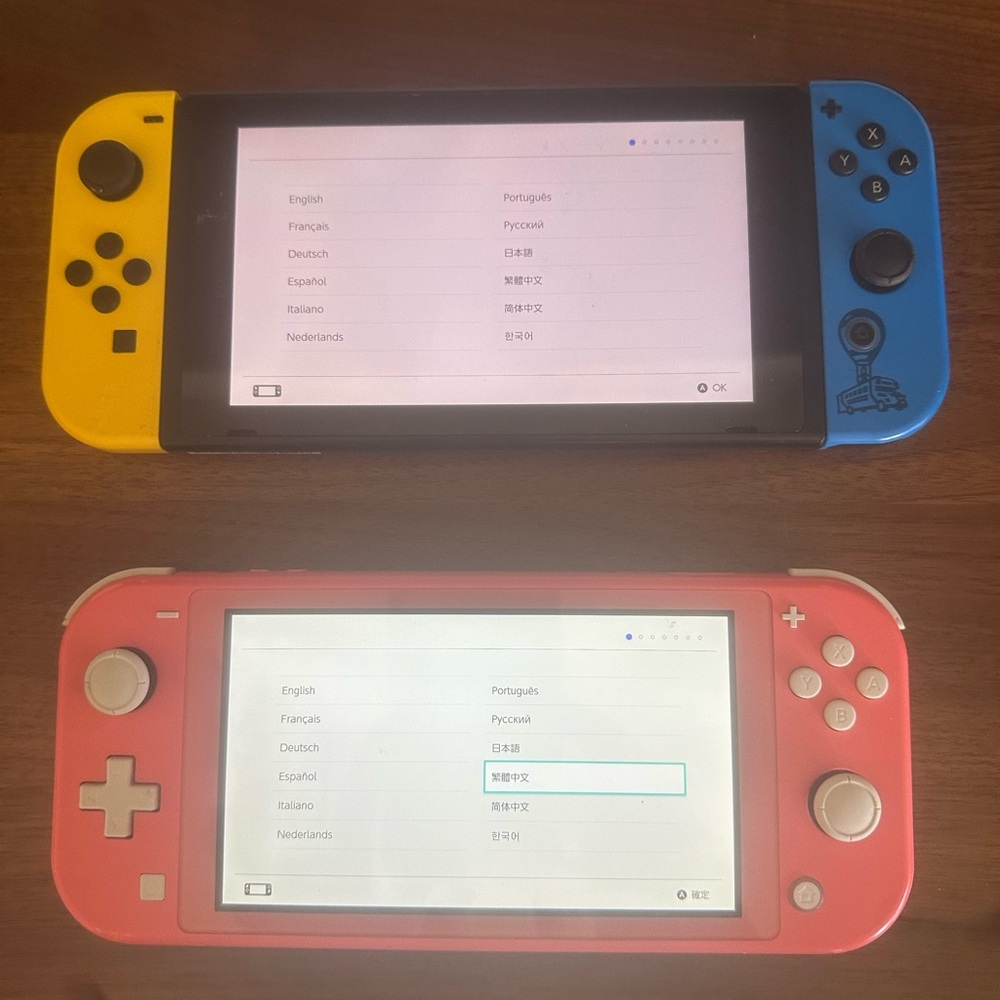 Bundle of 2 Nintendo Switch handheld game consoles.